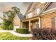A lovely two-story brick home featuring brick, stone, and shutter details, plus a two-car garage at 632 Creekside Trce, Covington, GA 30014