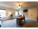 Spacious office with two windows, neutral paint, ceiling fan, and carpet flooring at 632 Creekside Trce, Covington, GA 30014