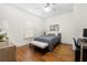 Bedroom featuring hardwood floors, a window, study desk and decorative bench seat at 1320 Hosea L Williams Ne Dr, Atlanta, GA 30317