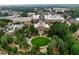 Scenic aerial view of a town featuring mature trees and brick buildings at 145 Alcovy Ter, Alpharetta, GA 30009