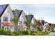 Charming street view of modern homes with solar panels and well-maintained landscaping at 145 Alcovy Ter, Alpharetta, GA 30009