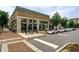 Attractive exterior featuring outdoor seating and a well-maintained sidewalk, ideal for dining and window shopping at 145 Alcovy Ter, Alpharetta, GA 30009