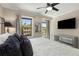 Luxurious bedroom featuring a bed, large windows, and a modern TV at 738 Saint Charles Ne Ave, Atlanta, GA 30306