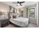 Inviting bedroom featuring a cozy bed, complemented by natural light streaming through the windows at 738 Saint Charles Ne Ave, Atlanta, GA 30306