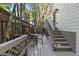 Back deck featuring a dining table and views of the bamboo plants at 738 Saint Charles Ne Ave, Atlanta, GA 30306