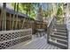 Outdoor deck with stairs, complemented by bamboo plants at 738 Saint Charles Ne Ave, Atlanta, GA 30306