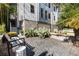 Modern exterior with lush plants and charming bench seating at 738 Saint Charles Ne Ave, Atlanta, GA 30306