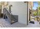 Charming exterior with a gray deck, stairs, and natural lighting at 738 Saint Charles Ne Ave, Atlanta, GA 30306