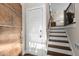 Inviting foyer with hardwood floors and stairs leading to living spaces at 738 Saint Charles Ne Ave, Atlanta, GA 30306