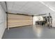 Bright garage featuring a gray floor, utilities, and plenty of room at 738 Saint Charles Ne Ave, Atlanta, GA 30306