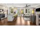 Open concept living space with modern kitchen and hardwood floors at 738 Saint Charles Ne Ave, Atlanta, GA 30306