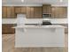 Modern kitchen with stainless steel appliances, granite countertops, and wood cabinetry at 131 Hampton Ter, Dallas, GA 30157