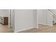 Bright living room area with sleek vinyl floors and neutral walls at 131 Hampton Ter, Dallas, GA 30157