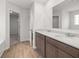 Bathroom featuring a dual sink granite vanity, and tile flooring at 171 Hampton Ter, Dallas, GA 30157
