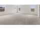 Carpeted bedroom featuring multiple windows, providing natural light at 171 Hampton Ter, Dallas, GA 30157