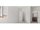 Bright bedroom featuring large windows, open closet, and bathroom access at 171 Hampton Ter, Dallas, GA 30157