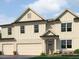 Charming two-story home boasts a modern farmhouse design with a two-car garage and manicured lawn at 171 Hampton Ter, Dallas, GA 30157