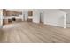 Spacious open-concept living space features wood-look flooring, kitchen with island, and plenty of room at 171 Hampton Ter, Dallas, GA 30157