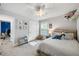 Neutral bedroom featuring natural light, ceiling fan, a comfortable bed and carpeted floors at 2136 Oak Knob Dr, Decatur, GA 30032