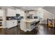 Modern kitchen with white cabinetry, a central island, and stainless steel appliances at 2136 Oak Knob Dr, Decatur, GA 30032