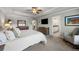 Large primary bedroom features trey ceiling, dresser and adjacent bathroom at 2136 Oak Knob Dr, Decatur, GA 30032