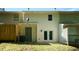 Back exterior view with an AC unit, a porch and sliding glass doors at 2294 Salt Springs Pl, Austell, GA 30168