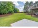 Spacious backyard with lush green lawn, ideal for outdoor activities and relaxation at 2675 Sugar Mill Dr, Atlanta, GA 30316
