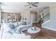 Spacious living room with open floor plan, seamlessly connecting to the kitchen and dining areas at 2675 Sugar Mill Dr, Atlanta, GA 30316