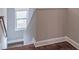 Staircase with wood flooring and white trim leading to the upper level at 2675 Sugar Mill Dr, Atlanta, GA 30316