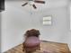 Bedroom with hardwood floors, a comfortable chaise lounge, and a bright window at 4076 Blanton Sw Ave, Atlanta, GA 30331