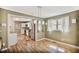 Open dining area featuring hardwood floors and bright natural light at 4076 Blanton Sw Ave, Atlanta, GA 30331