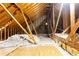 Insulated attic with exposed wood framing, providing a view of the home's structure at 415 Morgan Falls Chase, Canton, GA 30114
