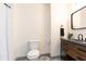 Contemporary bathroom featuring patterned tile floor, shower with curtain, and vanity sink at 415 Morgan Falls Chase, Canton, GA 30114
