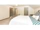 Spacious bedroom with grey doors, ceiling fan, and neutral walls and carpets at 415 Morgan Falls Chase, Canton, GA 30114