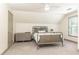 Cozy bedroom with a neutral color scheme, soft carpet, and ample natural light at 415 Morgan Falls Chase, Canton, GA 30114