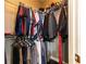 Walk-in closet with lots of space for hanging and folded clothes and shoe racks at 415 Morgan Falls Chase, Canton, GA 30114