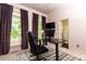 Office space featuring two windows, computer desk, and a modern, comfortable chair at 415 Morgan Falls Chase, Canton, GA 30114