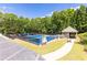 Community tennis courts with shaded benches for breaks between sets at 415 Morgan Falls Chase, Canton, GA 30114