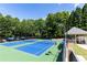 Community tennis courts with a covered seating area offer a place to relax at 415 Morgan Falls Chase, Canton, GA 30114