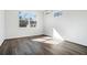 Bright bedroom with large window offering natural light and wood flooring at 100 Dahlia Nw Ave, Atlanta, GA 30314