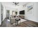 Contemporary living area with sleek furnishings, natural light, and stylish flooring at 100 Dahlia Nw Ave, Atlanta, GA 30314
