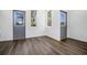Inviting living area filled with natural light and featuring beautiful wood floors at 100 Dahlia Nw Ave, Atlanta, GA 30314