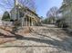 Multi-tiered screened-in porch on a home backing up to a large grassy sloping backyard at 1594 Stoddard Nw Ct, Kennesaw, GA 30152