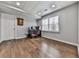 Finished basement space with wood floors, a built-in desk, and a window at 1594 Stoddard Nw Ct, Kennesaw, GA 30152