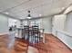 This basement area includes an island, table, seating, and storage at 1594 Stoddard Nw Ct, Kennesaw, GA 30152