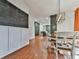 A view from the formal dining room looking into a modern kitchen at 1594 Stoddard Nw Ct, Kennesaw, GA 30152