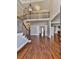 Grand foyer featuring hardwood floors, staircase with iron railings, and high ceilings at 1594 Stoddard Nw Ct, Kennesaw, GA 30152