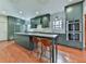 Modern kitchen boasts a large island, stainless steel appliances, and stylish cabinetry at 1594 Stoddard Nw Ct, Kennesaw, GA 30152