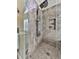 Contemporary shower with a rainfall shower head, unique tile, and built-in niche shelving at 1594 Stoddard Nw Ct, Kennesaw, GA 30152