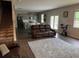 Open-concept living area with a view of the modern kitchen and dining area at 3604 Sw Wartrace Sw Dr, Atlanta, GA 30331